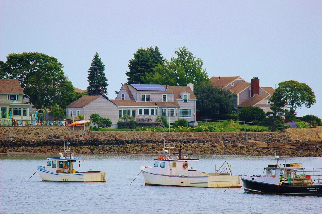 Picture of boats and shoreline taken with 200mm lens