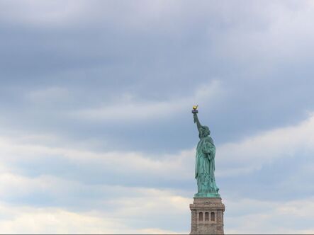 Negative space photo showing the Statue of Liberty